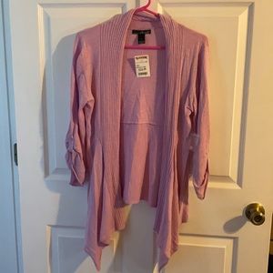 Brand new with tags and never been worn. Pink top